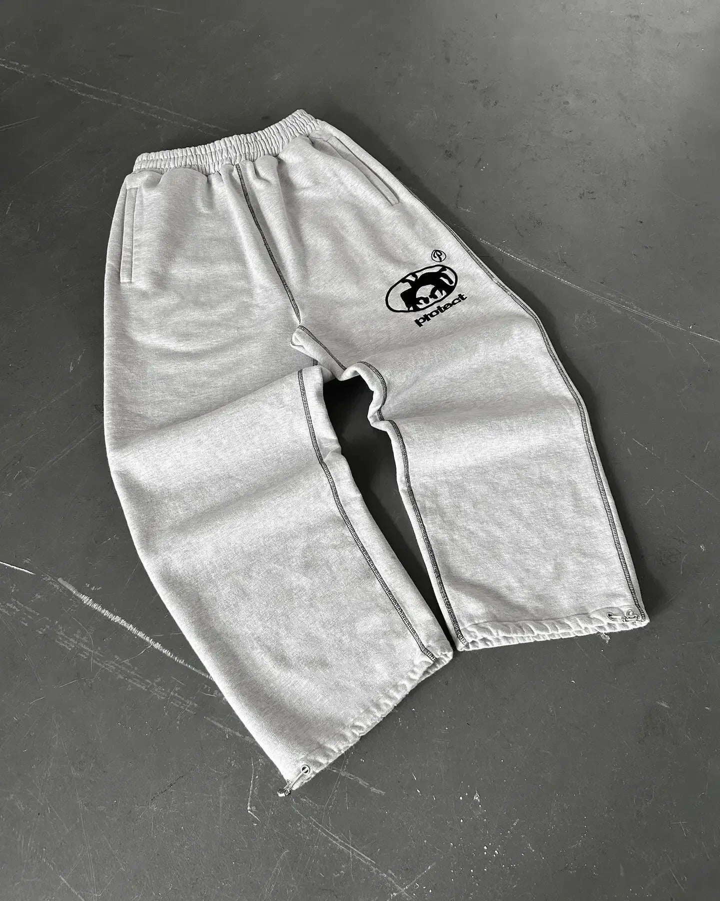PROTECT Cartoon Logo Sweatpants
